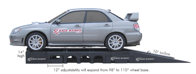 Silver Subaru STI on Portable Pit stop Ramp for Rally drivers pit Crew